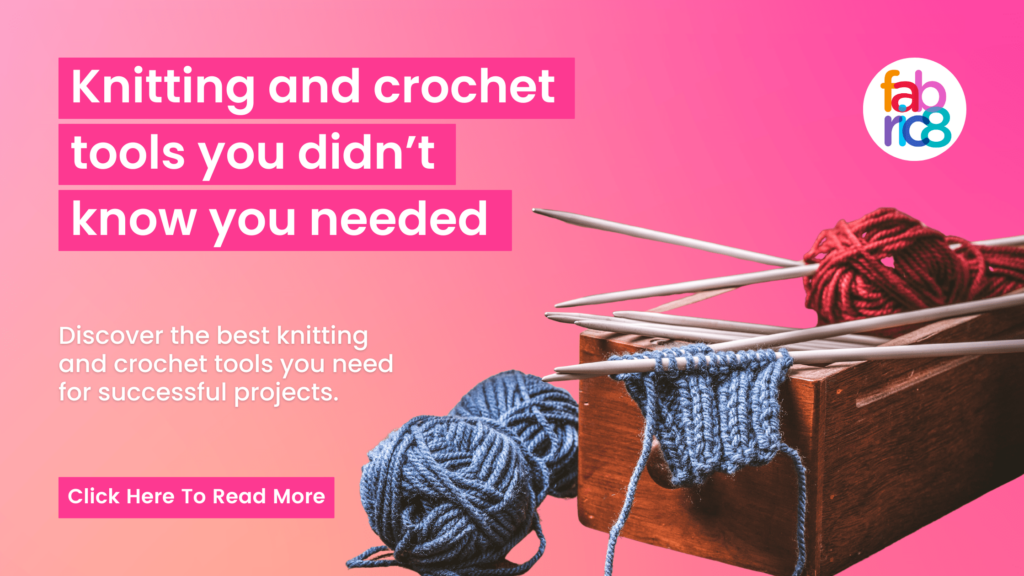 a pink background with text and knitting needles and knitting wool in a wooden box