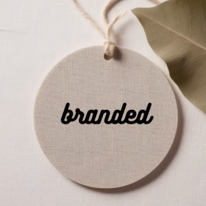 a tag label with the words 'branded' written on them 